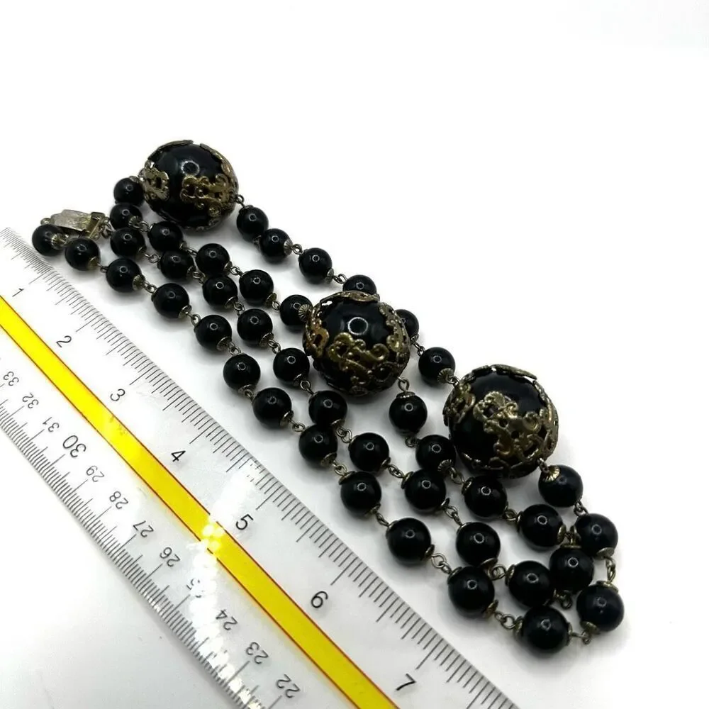 Vintage long black beaded necklace